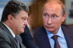 Порошенко обсудил с Путином освобождение политзаключенных